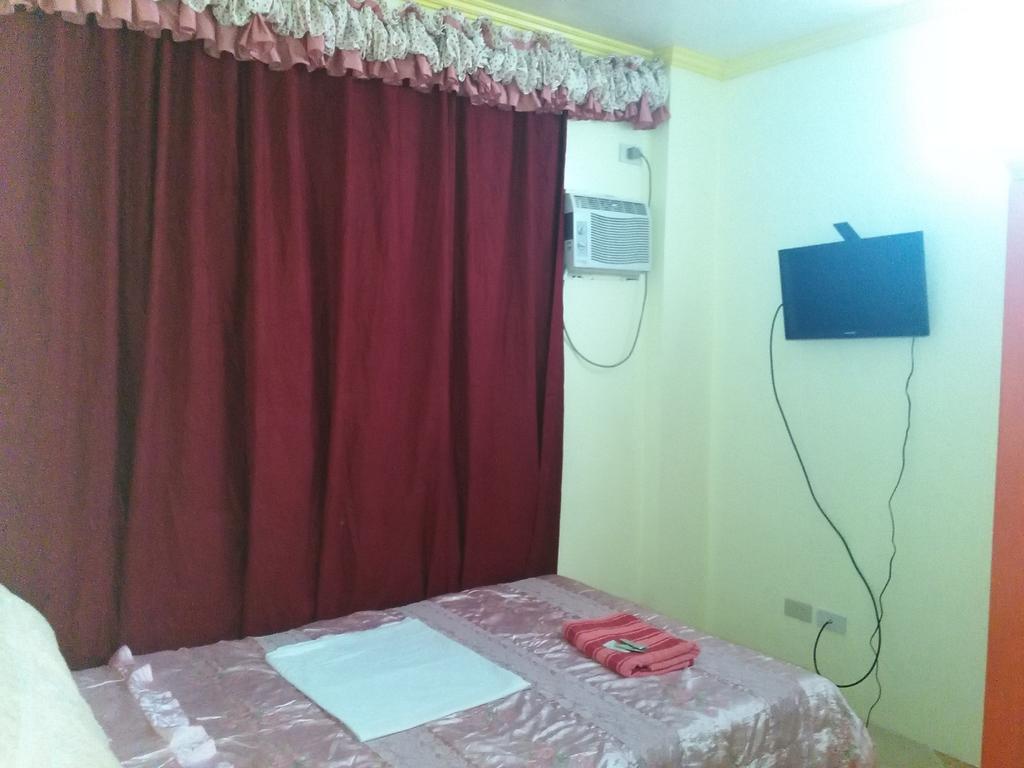 Aranas-Carillo Travellers Inn Kalibo Quarto foto